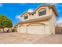 Two-story house with a three-car garage and side yard view at 3664 E Juanita Ave, Gilbert, AZ 85234