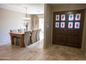 Elegant entryway with double doors featuring beveled glass insets at 7701 S Butte Ave, Tempe, AZ 85284