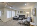 Another view of the living room and window at 7750 E Broadway Rd # 83, Mesa, AZ 85208