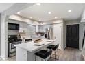 Updated kitchen featuring an island and stainless steel appliances at 8578 E Indian School Rd # I, Scottsdale, AZ 85251