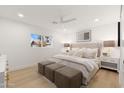 Spacious bedroom with plush bed, soft linens, and ample natural light at 8602 E Plaza Ave, Scottsdale, AZ 85250