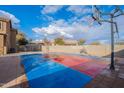 Outdoor basketball court with surrounding backyard at 909 W Elm Ave, Coolidge, AZ 85128