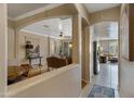 View of living room and kitchen from entryway at 141 W Roadrunner Dr, Chandler, AZ 85286
