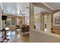 Living room with hardwood floors and comfortable seating at 141 W Roadrunner Dr, Chandler, AZ 85286