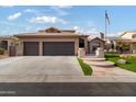 Two-story home with landscaped yard, three-car garage, and attractive exterior at 3182 N 159Th Dr, Goodyear, AZ 85395