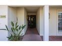 Close up of home entryway with secure door and desert landscaping at 5306 N 20Th St, Phoenix, AZ 85016