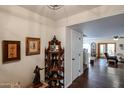 Open concept entryway leading to living area with hardwood floors and view to outdoor living at 5306 N 20Th St, Phoenix, AZ 85016