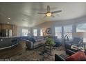 Spacious living room with comfortable seating and large windows at 650 N Hawes Rd # 2709, Mesa, AZ 85207