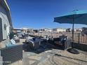 Outdoor patio furniture under umbrella, inviting space at 650 N Hawes Rd # 2709, Mesa, AZ 85207