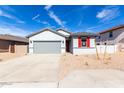 Charming single-story home featuring a two-car garage and drought resistant landscaping at 7366 E Hackamore Ln, San Tan Valley, AZ 85143