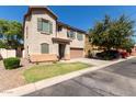 Two-story house with a two-car garage and spacious driveway at 8454 E Keats Ave, Mesa, AZ 85209