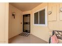 Condo entry with security door and small bench at 14017 N 111Th Ave, Sun City, AZ 85351