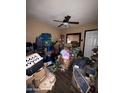 Spare bedroom with stacked items and a pet carrier at 215 S 32Nd Dr, Phoenix, AZ 85009