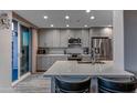 Modern kitchen with stainless steel appliances and a large island at 2302 N Central Ave # 401, Phoenix, AZ 85004