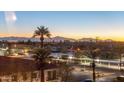 Evening city view with palm trees and mountain backdrop at 2302 N Central Ave # 401, Phoenix, AZ 85004