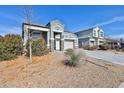 Picture of charming single-Gathering home with a two-car garage and desert landscaping at 30968 W Monterey Ave, Buckeye, AZ 85396