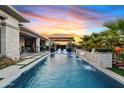 Luxury pool with a pergola and spacious patio area at 3990 E Alameda Ln, Gilbert, AZ 85298