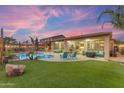 Relaxing backyard oasis with a sparkling pool at 6107 W Hedgehog Pl, Phoenix, AZ 85083