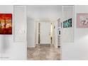 Bright entryway with tiled floors and decorative room dividers at 6457 E Dallas St, Mesa, AZ 85205