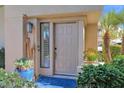 Front entrance featuring a blue mat, and a giraffe statue to give added charm at 7400 E Gainey Club Dr # 222, Scottsdale, AZ 85258