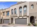 Modern 2-story townhome with attached garage and landscaped front yard at 7460 E Via De Luna Dr, Scottsdale, AZ 85255