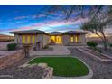 Single story home with welcoming entry and attractive landscaping at 8793 W Villa Lindo Dr, Peoria, AZ 85383