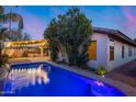 Inviting backyard pool and outdoor seating area, perfect for relaxation and entertaining guests at 22852 N 103Rd Ave, Peoria, AZ 85383