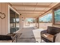 Covered patio overlooking the backyard at 3315 N Datura Ct, Maricopa, AZ 85139