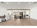 Spacious living room featuring fireplace, and sliding doors that provide plenty of natural light at 338 E Elm St, Phoenix, AZ 85012