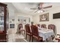 Dining room with wood table and six chairs at 4219 W Pasadena Ave, Phoenix, AZ 85019