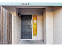 Condo front entrance with black metal door and decorative glass at 4648 W Continental Dr, Glendale, AZ 85308