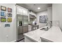 Modern kitchen with stainless steel appliances and white cabinets at 6803 E Main St # 1110, Scottsdale, AZ 85251