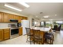 Modern kitchen with stainless steel appliances and an island at 7755 E Laguna Azul Ave # 147, Mesa, AZ 85209