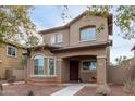 Two-story house with a front porch and walkway at 9331 S 33Rd Gln, Laveen, AZ 85339