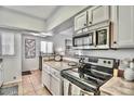 Well-equipped kitchen featuring a smooth-top stove at 10401 N Saguaro Blvd # 213, Fountain Hills, AZ 85268