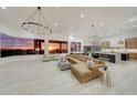 Luxury living room with sunset views and modern furniture at 11776 N 119Th St, Scottsdale, AZ 85259