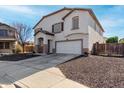 Two-story house with a large garage and gravel driveway at 12113 W Planada Ln, Peoria, AZ 85383