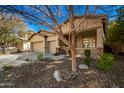 Two-story house with two-car garage and gravel landscaping at 12759 W Eagle Ridge Ln, Peoria, AZ 85383