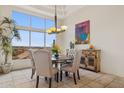 Elegant dining room with large windows and mountain views at 13512 N Granite Way, Fountain Hills, AZ 85268