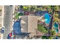 Aerial view showing a house with a pool and a large backyard at 1811 E Powell Way, Chandler, AZ 85249