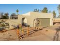 View of the home's exterior, highlighting the architectural design and landscaping at 2916 S Price Rd, Tempe, AZ 85282