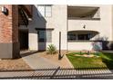 Exterior view of building showcasing stairs and landscaping at 3302 N 7Th St # 133, Phoenix, AZ 85014