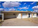 Updated single story home with carport and front yard at 3554 W Royal Palm Rd, Phoenix, AZ 85051