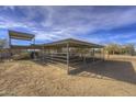 Metal corral with covered shelter, perfect for horses at 35849 N 3Rd St, Phoenix, AZ 85086