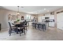 Spacious kitchen featuring an island, stainless steel appliances, and ample counter space at 36811 N El Morro Trl, San Tan Valley, AZ 85140