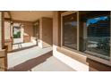 Covered front porch with view of the front yard at 42276 W Chisholm Dr, Maricopa, AZ 85138