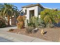 Two-story house with a two-car garage and xeriscaping at 4376 E Anderson Dr, Phoenix, AZ 85032