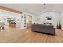 Bright living room with hardwood floors and an open floor plan at 4501 E Paradise Ln, Phoenix, AZ 85032