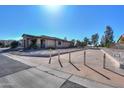 House exterior showing a side view with a concrete driveway and landscaping at 4557 W Agave Ave, Eloy, AZ 85131