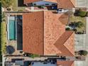 Aerial view showing home, pool, and surrounding neighborhood at 5582 W Aster Dr, Glendale, AZ 85304